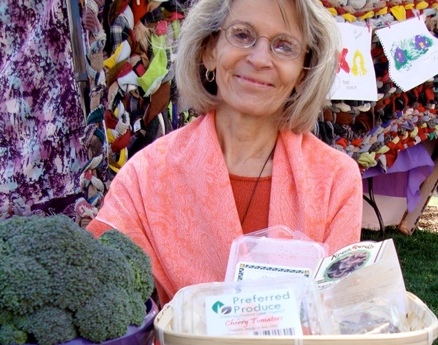 A lady is posing for a picture